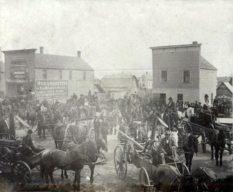 Farmers picking up McCormick farm implements at M. O. Bakko Store, Kenyon Minnesota, 1901