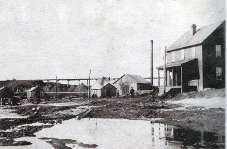 A picture of the Crosby mine in early 1900's  one of the location houses is pictured at right