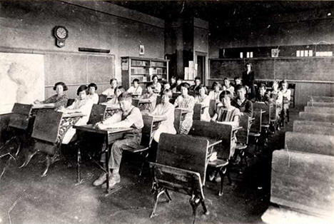 Students and teacher in a Tenstrike school classroom, 1920