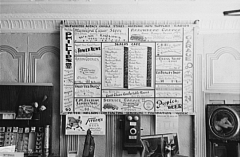 Bill of fare, advertising board and goods in restaurant, Tower Minnesota, 1937
