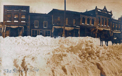 Street scene after winter storm, Alden Minnesota, 1909
