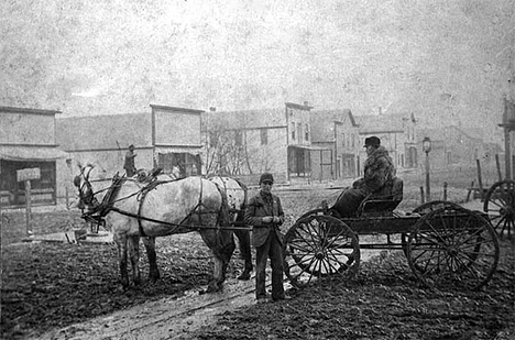 Muddy springtime road in Audubon Minnesota, 1898