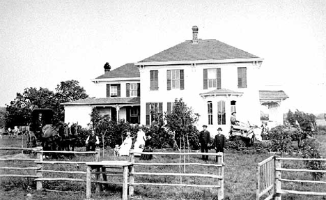 Samuel A. and Gustava Samuelson Johnson and children at their home four miles northwest of Becker Minnesota, 1890