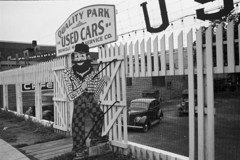 Paul Bunyan at a used car dealer, Bemidji Minnesota, 1939