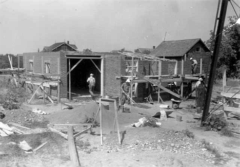 Village hall, jail, and pumping station under construction, Buckman Minnesota, 1936