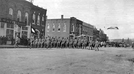 Home Guards marching on Main Street on victory day, Chatfield Minnesota, 1918