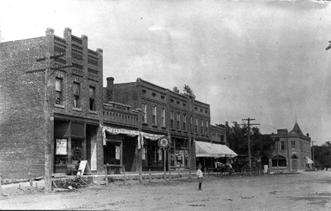View of street in Claremont, including Bert Littel's store, 1911