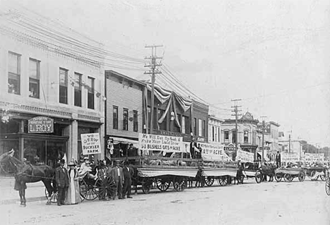 Main Street in Crookston during a campaign parade for R. T. Buckler, candidate for state senator, 1914