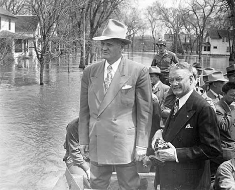 Crookston Mayor and Governor Youngdahl viewing flood at Crookston, 1950