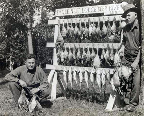 Duck hunters display their quarry at Eagle Nest Lodge, Deer River, 1927