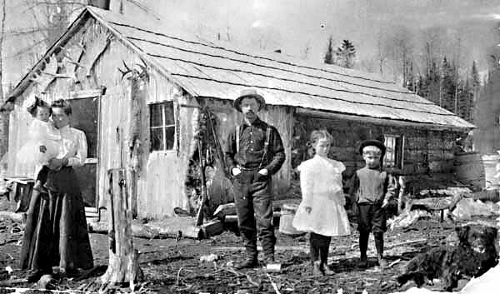 George Rahier Jr at homestead near Effie Minnesota, 1910