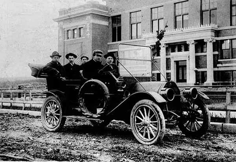 Patrick J. Hogan at the wheel of EMF automobile, first car in Gilbert Minnesota, 1911