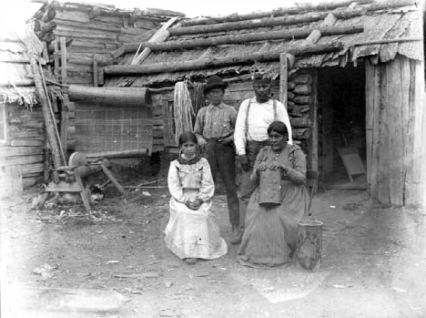 Chippewa Indian family at their home in Indian village near Grand Marais, 1904  