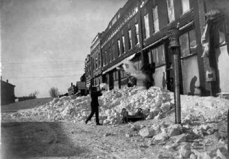 Sixth Street after snowstorm, Hancock Minnesota, 1910's