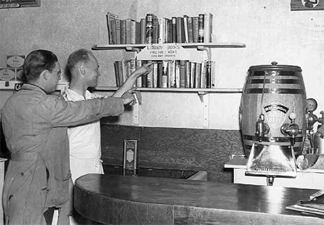 Library station in Lloyd Blowers Cafe, Hartland Minnesota, 1938