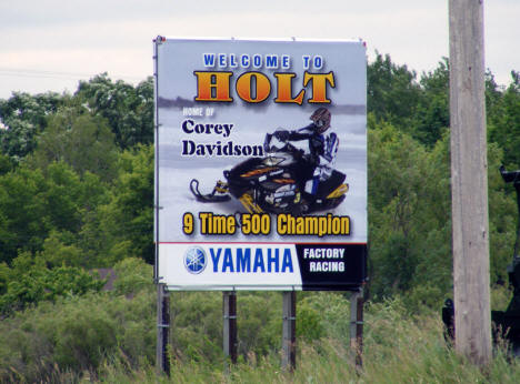 Sign noting that Holt is the home of Cory Davidson, snowmobile racing champion