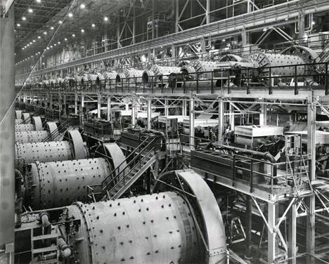 Interior of concentrator building with ball mills at Erie Mining Company, Hoyt Lakes Minnesota, 1950
