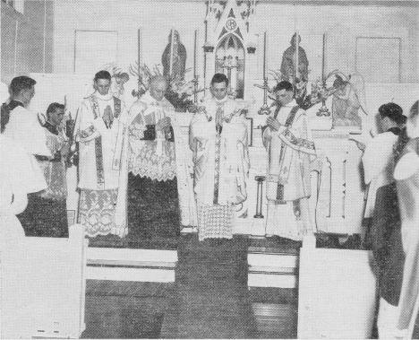 Father Golden celebrates his first mass at St. Mary's Catholic Church in Keewatin Minnesota