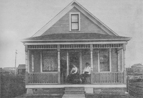 Mr. and Mrs. Nels Lindahl and son, Sig. The house is now the Matosich residence. Early Keewatin Minnesota