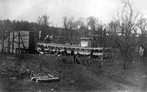 Steamboat Selkirk at Fargo-Moorhead; uncompleted Northern Pacific Railway bridge, 1871