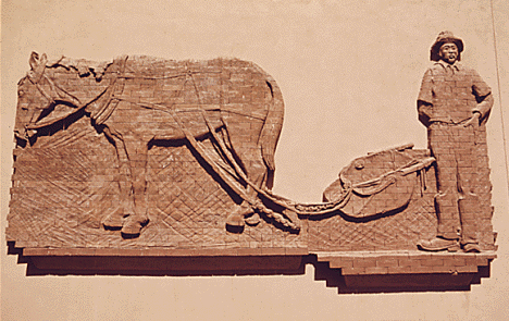 Brick sculpture showing life in 1850's, New Ulm Minnesota, 1974