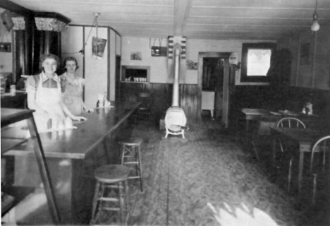 Rose Uran and Dorothy Westling (sisters) in the Northome Cafe, 1943