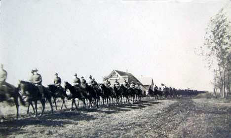 Fort Sheridan Cavalry marching through Prinsburg Minnesota, 1900's