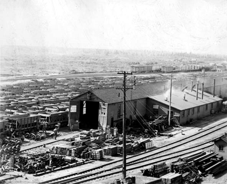 Railroad yards at Proctor; old car repair shop in foreground, 1910