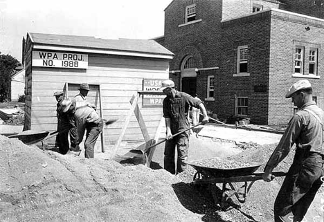 Works Progress Administration workers at work in front of new community hall, Red Lake Falls Minnesota, 1936