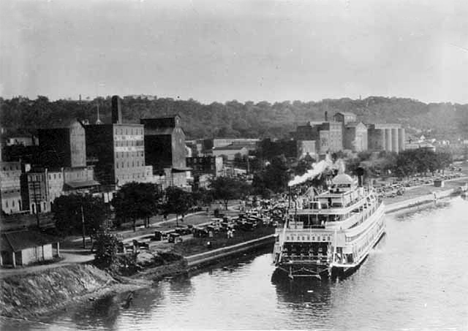 Steamboat arriving in Red Wing; view of the waterfront, Red Wing Minnesota, 1936