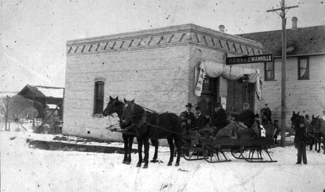Horse-drawn sleigh in front of the Bank of Swanville Minnesota, 1900