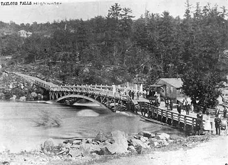 Flood waters on the St.Croix River washed out a portion of the bridge at Taylors Falls Minnesota, 1880