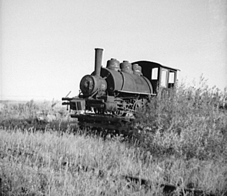 Abandoned locomotive at old sawmill, Tower Minnesota, 1937