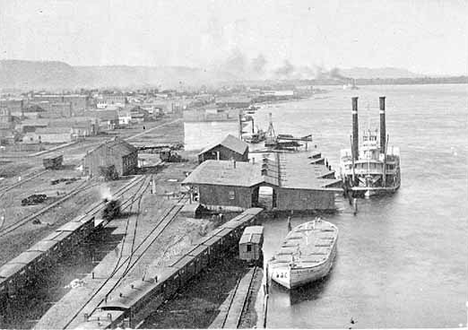 Winona riverfront showing steamboat dock and railroad station at foot of Winona Street, Winona, 1870