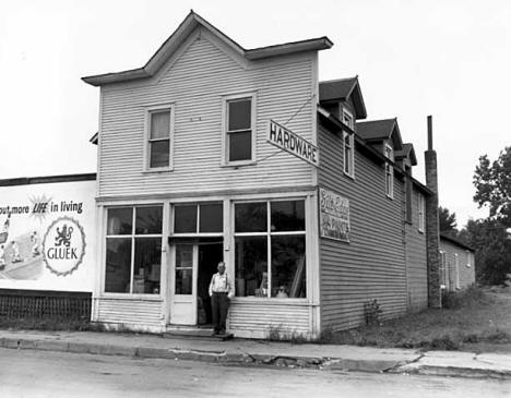 Owner Robert E. Gadola posed outside the Gadola Hardware Store in Ogilvie Minnesota, 1956