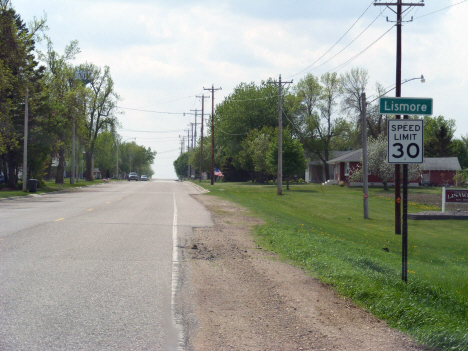 Road sign and street scene, Lismore Minnesota, 2014