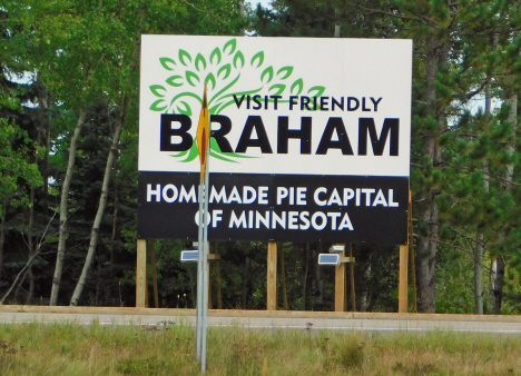 Visit Friendly Braham sign at junction of State Highways 65 and 107 near Braham Minnesota, 2018