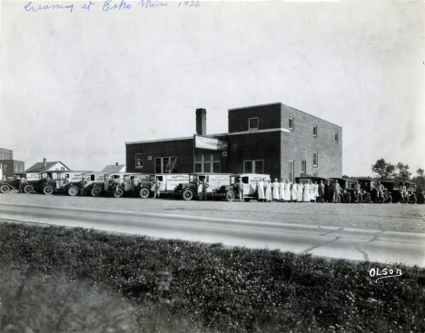 Arrowhead Co-Op Creamery Building with trucks and staff, downtown Esko, Esko Minnesota, 1926