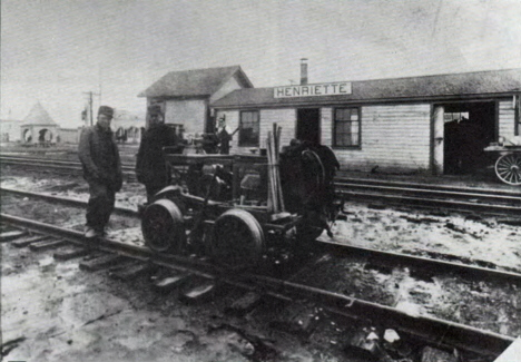 Section crew at Great Northern depot, Henriette Minnesota, 1915