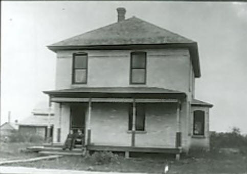 House occupied by two doctors who practiced in Buckman, MN. Drs. Dufort & Sequir, 1910's