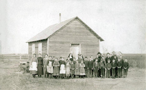 Teachers and pupils at first St. Michael's School, Buckman, Minnesota, 1888