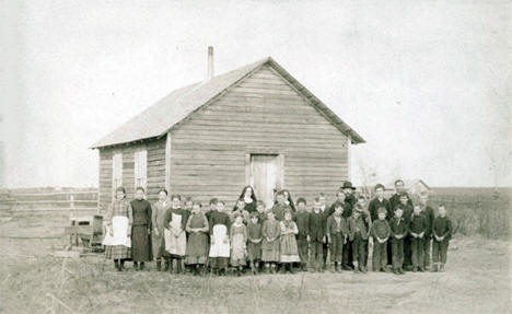Teachers and pupils at first St. Michael's School, Buckman, Minnesota, 1888