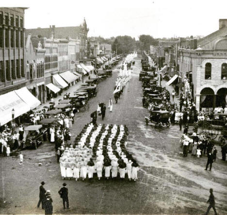 Red Cross volunteers marching down Division Street in Northfield, Minnesota, 1918