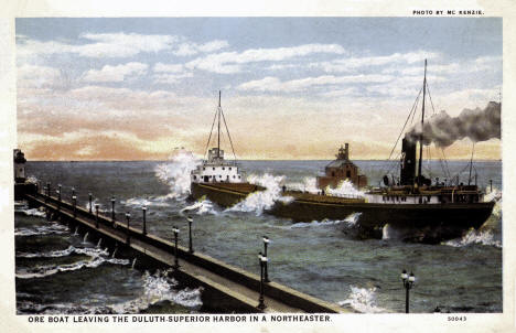 Ore Boat leaving Duluth Harbor in a northeaster, Duluth, Minnesota, 1920s