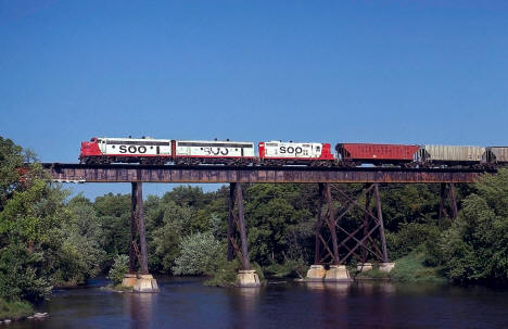 Soo Line train crossing the bridge over the Crow River at Rockford, Minnesota, 1978