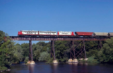 Soo Line train crossing the bridge over the Crow River at Rockford, Minnesota, 1978