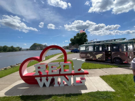 Iconic Love Red Wing sign with Red Wing Trolley in the background, Red Wing, Minnesota, 2024